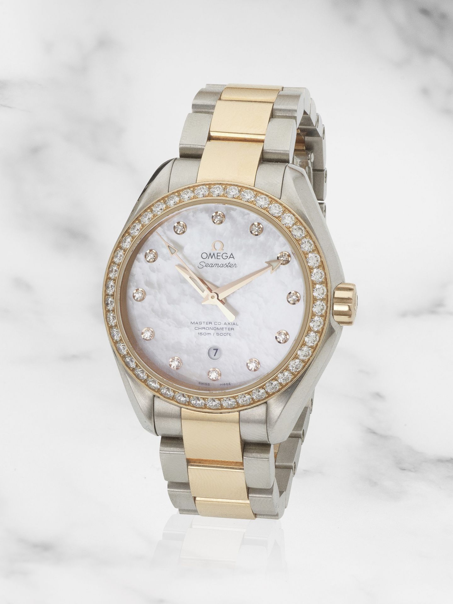 Omega. A lady's 18K rose gold and stainless steel diamond set automatic bracelet watch Omega. Mo...