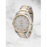 Omega. An 18K rose gold and stainless steel automatic calendar bracelet watch Omega. Montre brac...