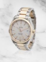 Omega. An 18K rose gold and stainless steel automatic calendar bracelet watch Omega. Montre brac...