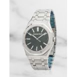 Audemars Piguet. A very fine stainless steel automatic calendar bracelet watch Audemars Piguet. ...