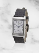 Jaeger-LeCoultre. A fine stainless steel rectangular reversible manual wind wristwatch with two ...