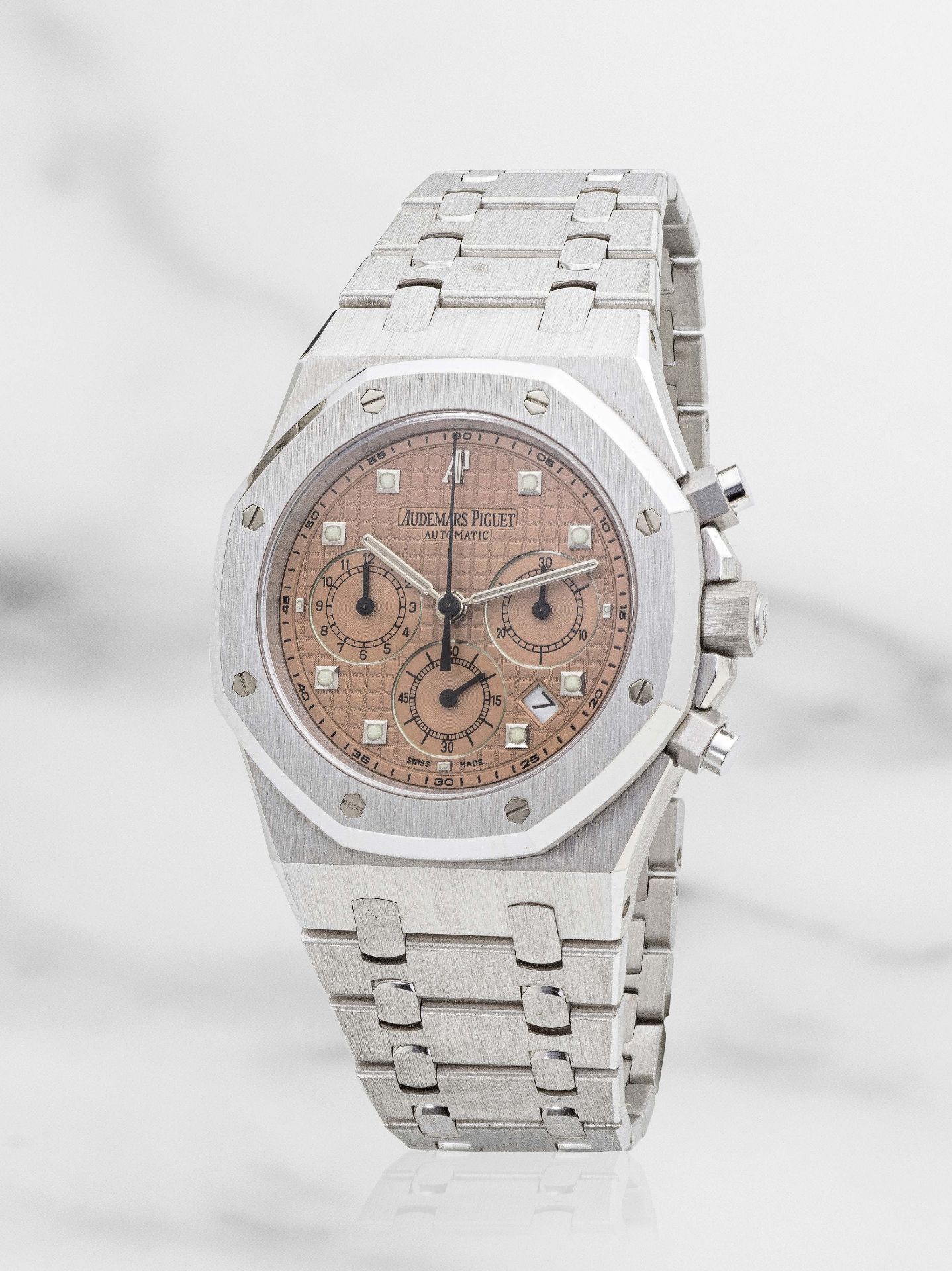 Audemars Piguet. A fine and rare 18K white gold automatic calendar chronograph bracelet watch Au...
