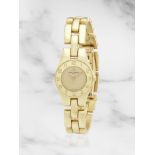 Baume & Mercier. A lady's 18K gold quartz bracelet watch Baume & Mercier. Montre de dame en or j...