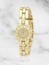 Baume & Mercier. A lady's 18K gold quartz bracelet watch Baume & Mercier. Montre de dame en or j...