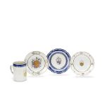 A group of Chinese export porcelain armorial wares comprising a tankard and three soup plates al...