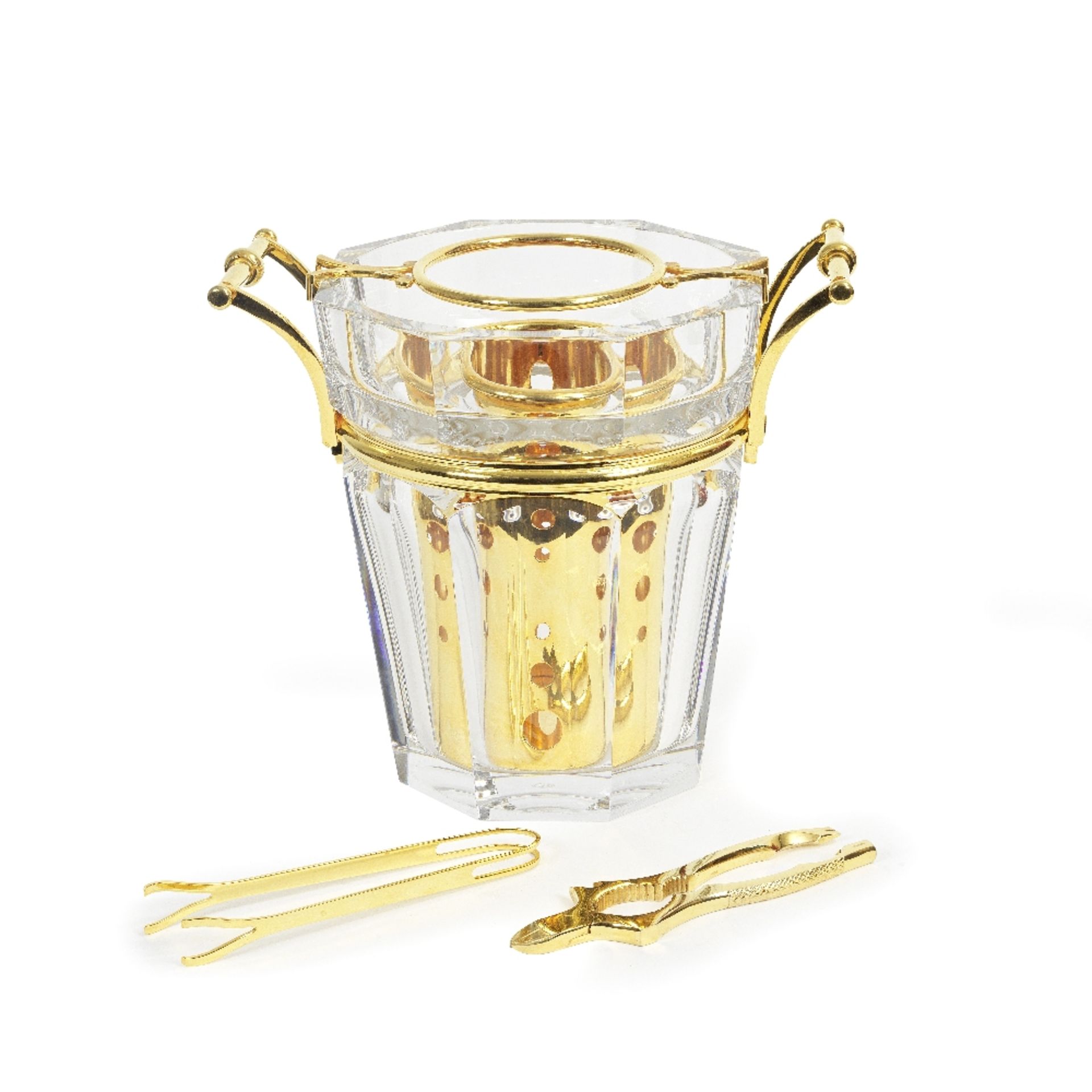 A Baccarat cut glass and gold plated mounted champagne bucket