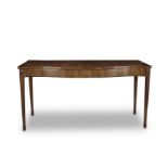 A George III mahogany serpentine serving table 1780-1795