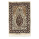 A charming Hereke carpet signed, West Anatolia, 150.5cm x 102.5cm