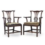 A pair of George III mahogany open armchairs (2)