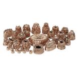 A good collection of thirty four 19th century copper jelly and confectionary moulds, the majorit...