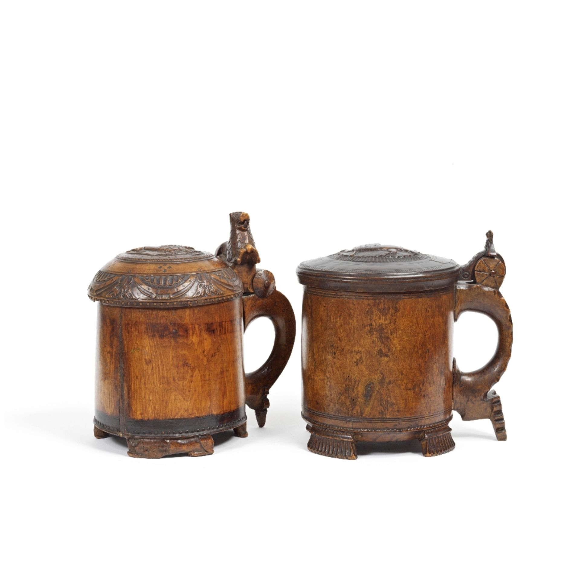 Two 18th century Norwegian carved and turned birch-wood tankards (2)