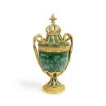 An impressive gilt bronze and malachite clad twin serpent handled Imperial style pedestal vase p...