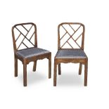 A matched pair of mahogany side chairs one chair late 18th century, the other late 19th/early 20...