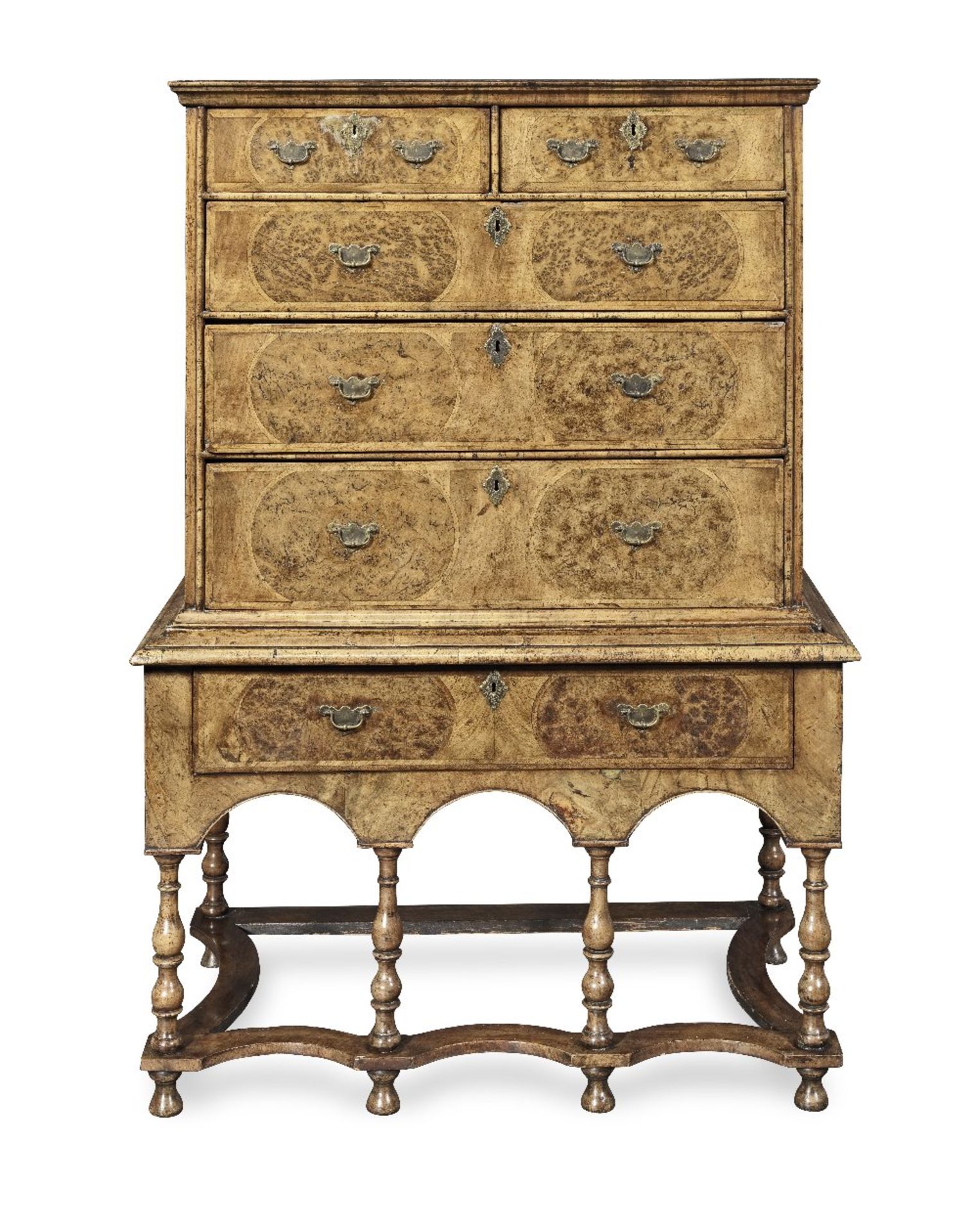 A Queen Anne or George I walnut, burr oak and featherbanded chest on stand 1700-1725, the legs a...