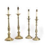 Two pairs of large brass candlesticks (4)