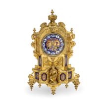 A mid 19th century gilt bronze and porcelain inset mantel clock the backplate signed Miller and...