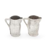 A pair of Victorian silver small jugs Edward Hutton, London 1887 (2)