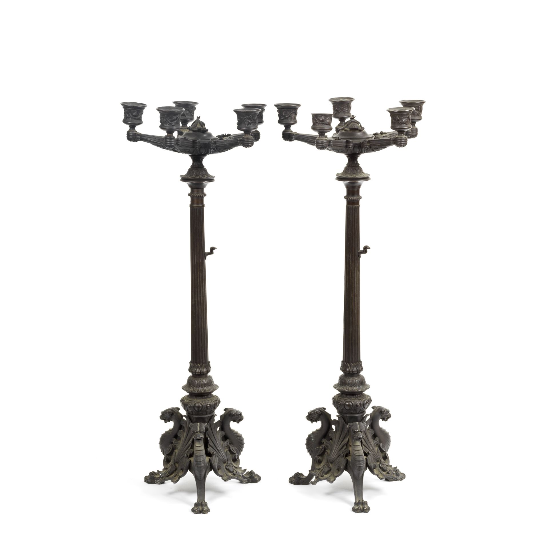 A pair of mid 19th century French patinated bronze five light candelabra in the neo-grec taste (2)