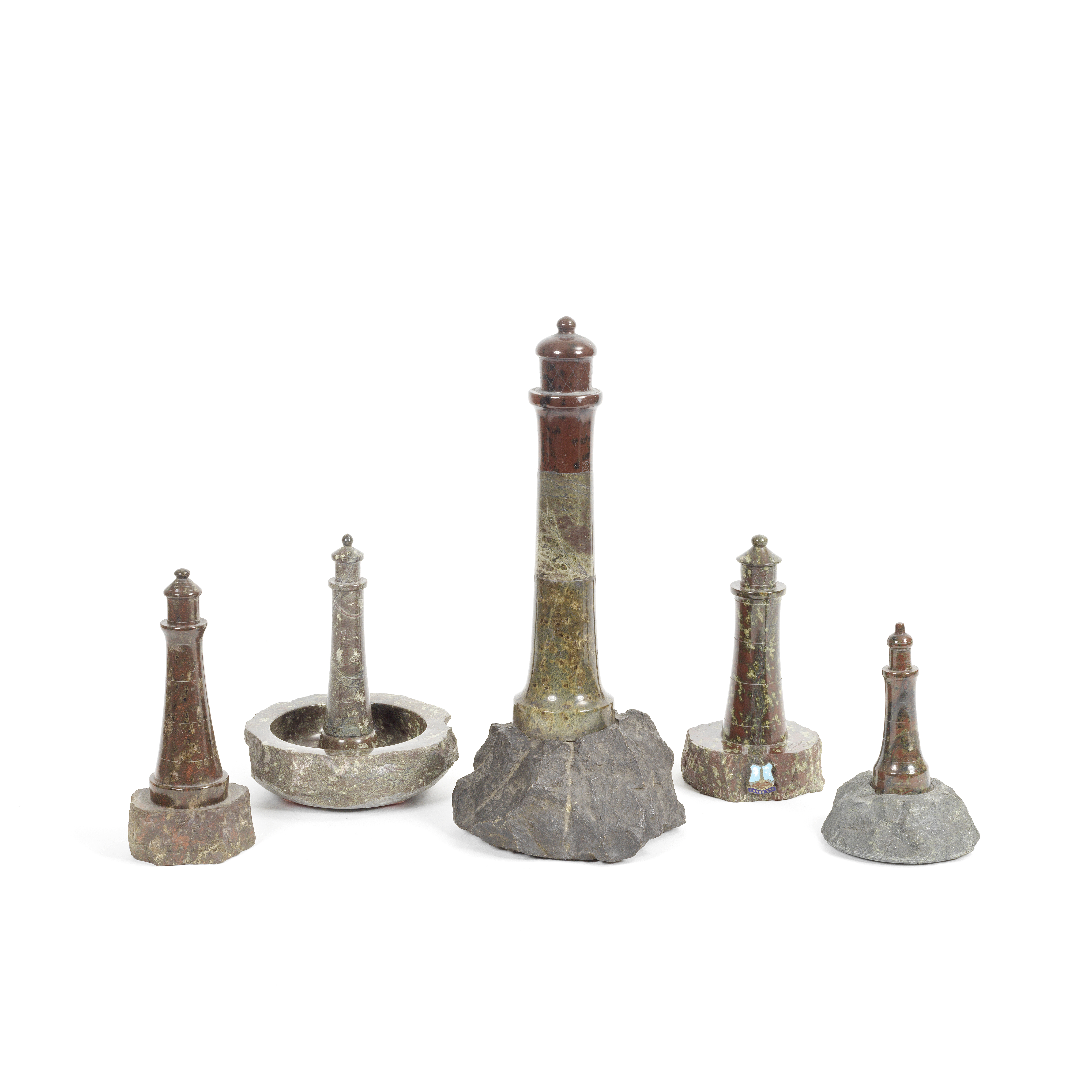 A group of five 20th century carved Cornish serpentine marble models of lighthouses (5)