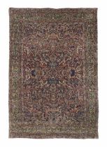 A Kirman wool rug Central Persia, 371cm x 265cm