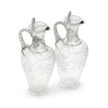 A pair of Victorian silver-mounted glass claret jugs William & George Sissons, Sheffield 1872