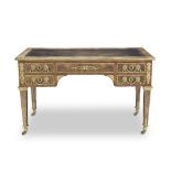 A French late 19th century ormolu mounted mahogany bureau plat or library table in the Louis XVI...