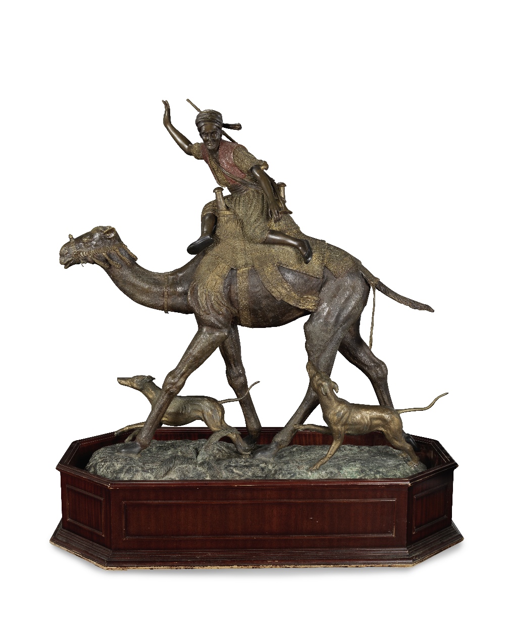 After Alfred Dubucand (French, 1828-1894): An impressive tri-colour patinated bronze figural gro...