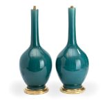 A pair of Chinese turquoise glazed porcelain vases adapted as lamp bases probably late 19th / ea...