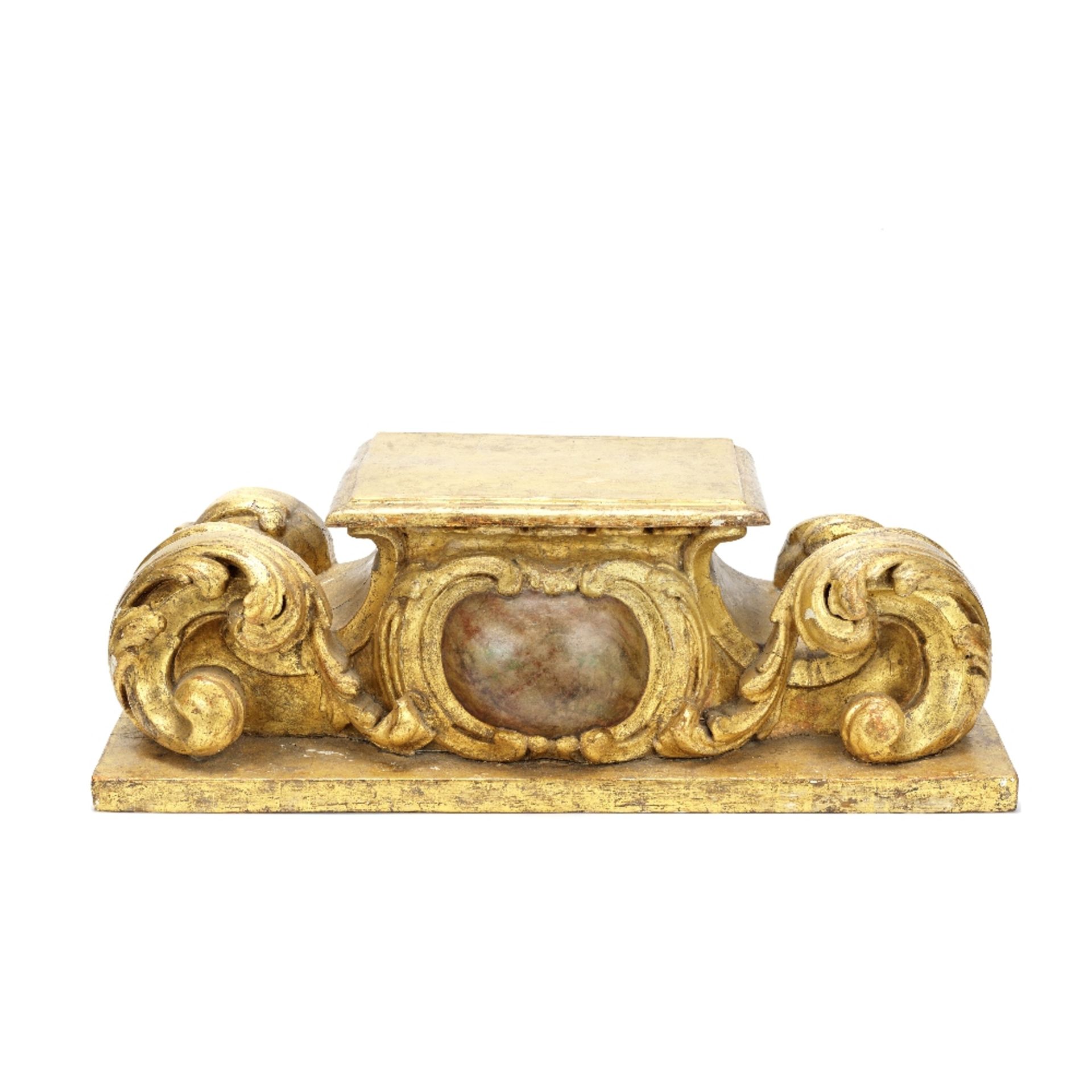 A Southern European carved painted wood and parcel gilt stand in the Baroque taste, probably 18t...