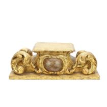 A Southern European carved painted wood and parcel gilt stand in the Baroque taste, probably 18t...