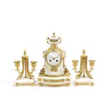 An early 20th century French gilt bronze and white marble boudoir clock garniture (3)