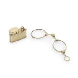 A 9ct gold petrol cigarette lighter and a pair of gold lorgnettes imported by Cohen & Charles, L...