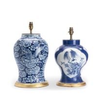 Two Chinese/Japanese blue and white decorated porcelain baluster vases mounted as lamp bases the...