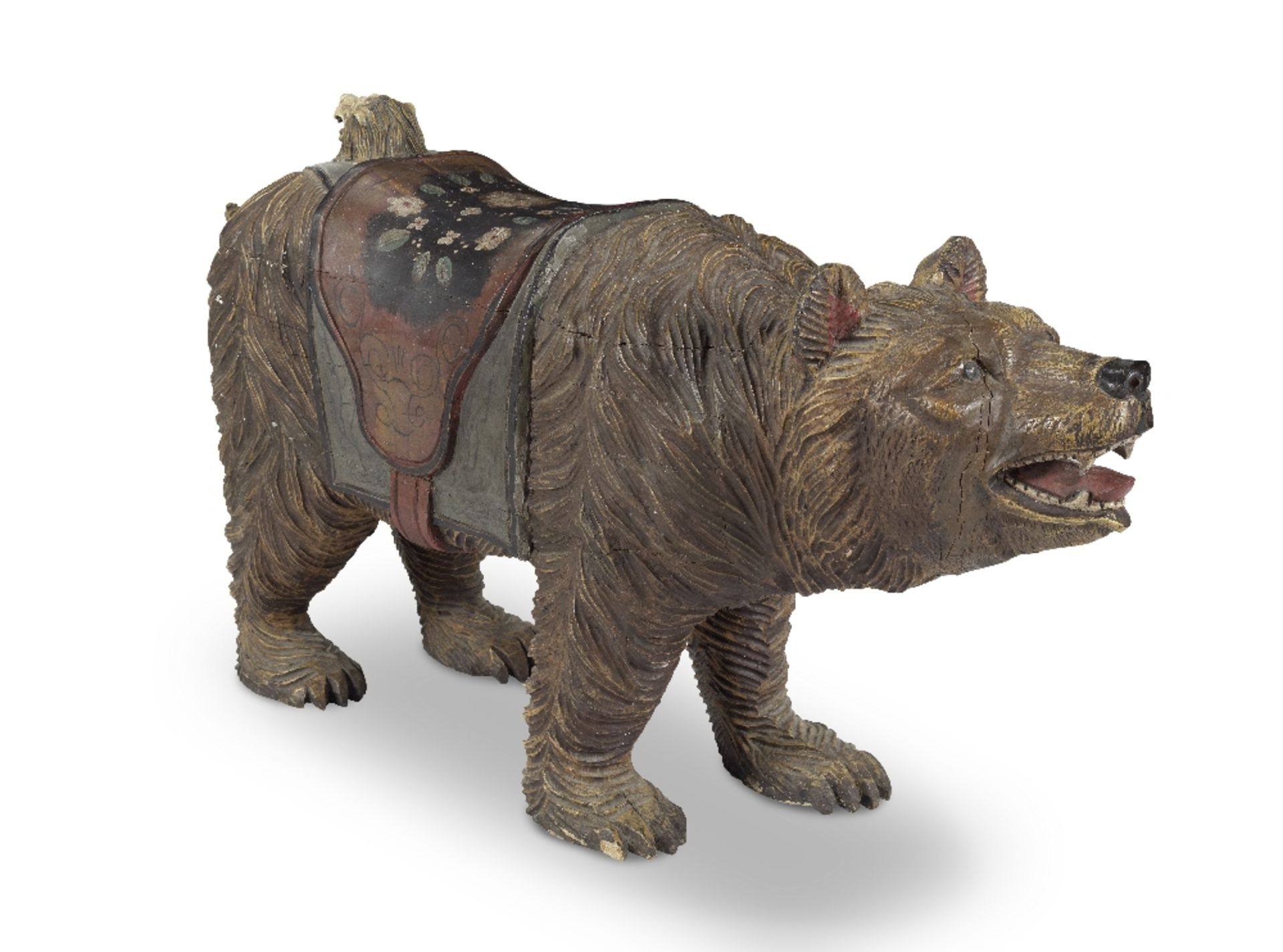 An early 20th century Continental carved and polychrome painted wood model of a bear probably Bl...