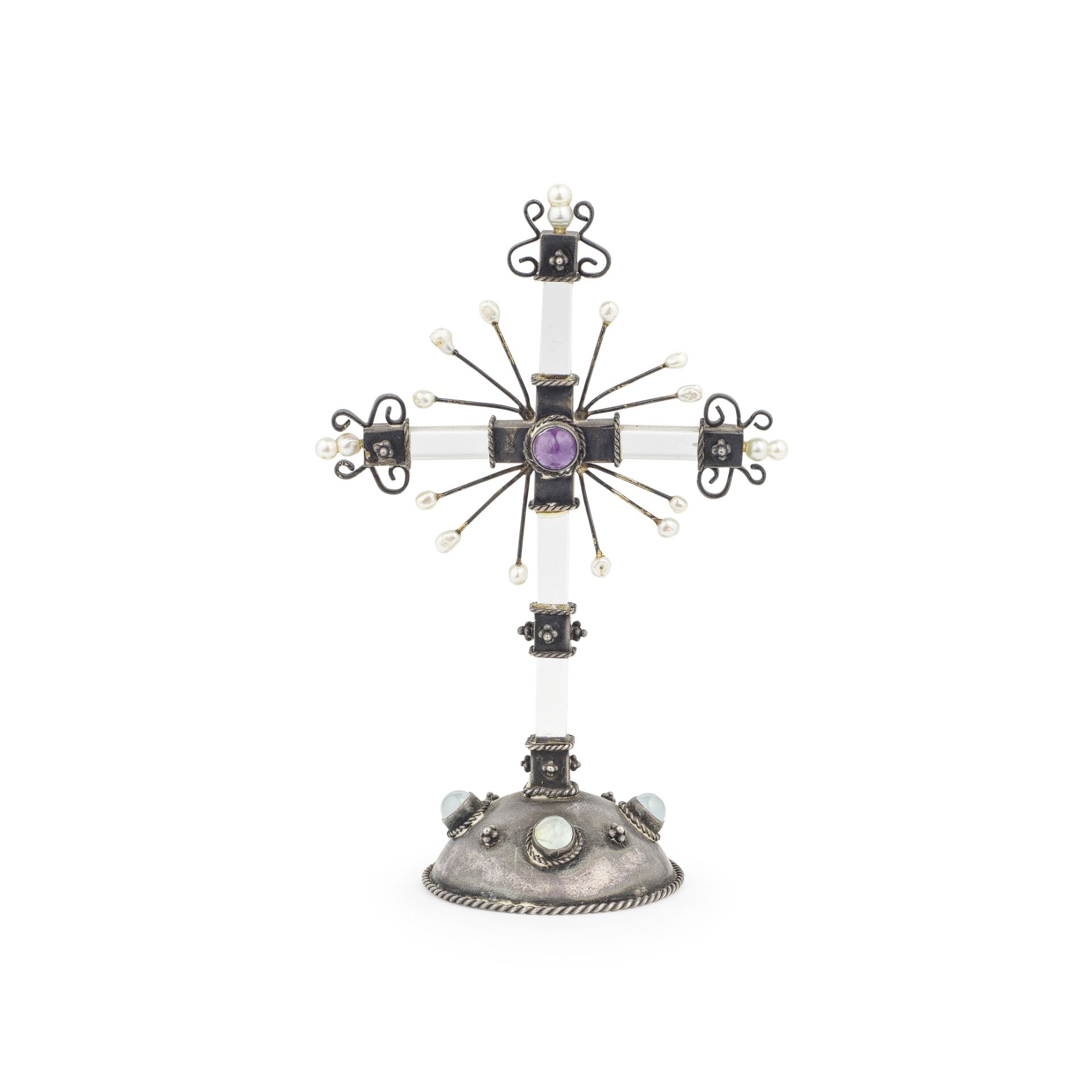 A small Arts and Craft silver-mounted and gem set standing cross in the style of Edward Spencer ...