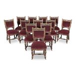 A set of twelve late Victorian oak chairs by R. Garnett and Sons (12)