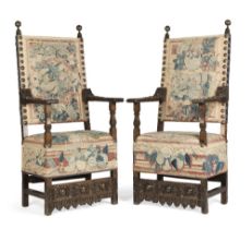 A pair of Italian late 17th century walnut armchairs (2)