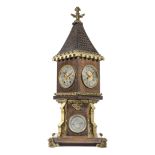 A late 19th/early 20th century German polished brass mounted and oak stained carved wood novelty...