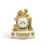 A late 19th century gilt bronze and marble figural mantel clock in the Louis XVI style