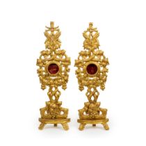 A pair of 19th century Continental carved giltwood monstrances or reliquaries in the Baroque sty...