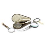 A collection of four desk magnifying glasses late 19th and 20th century (4)