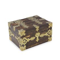 A late Victorian gilt brass mounted coromandel jewellery box the interior with inset engraved re...