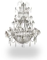 A late 19th century eighteen light tole and cut glass tent and bag chandelier