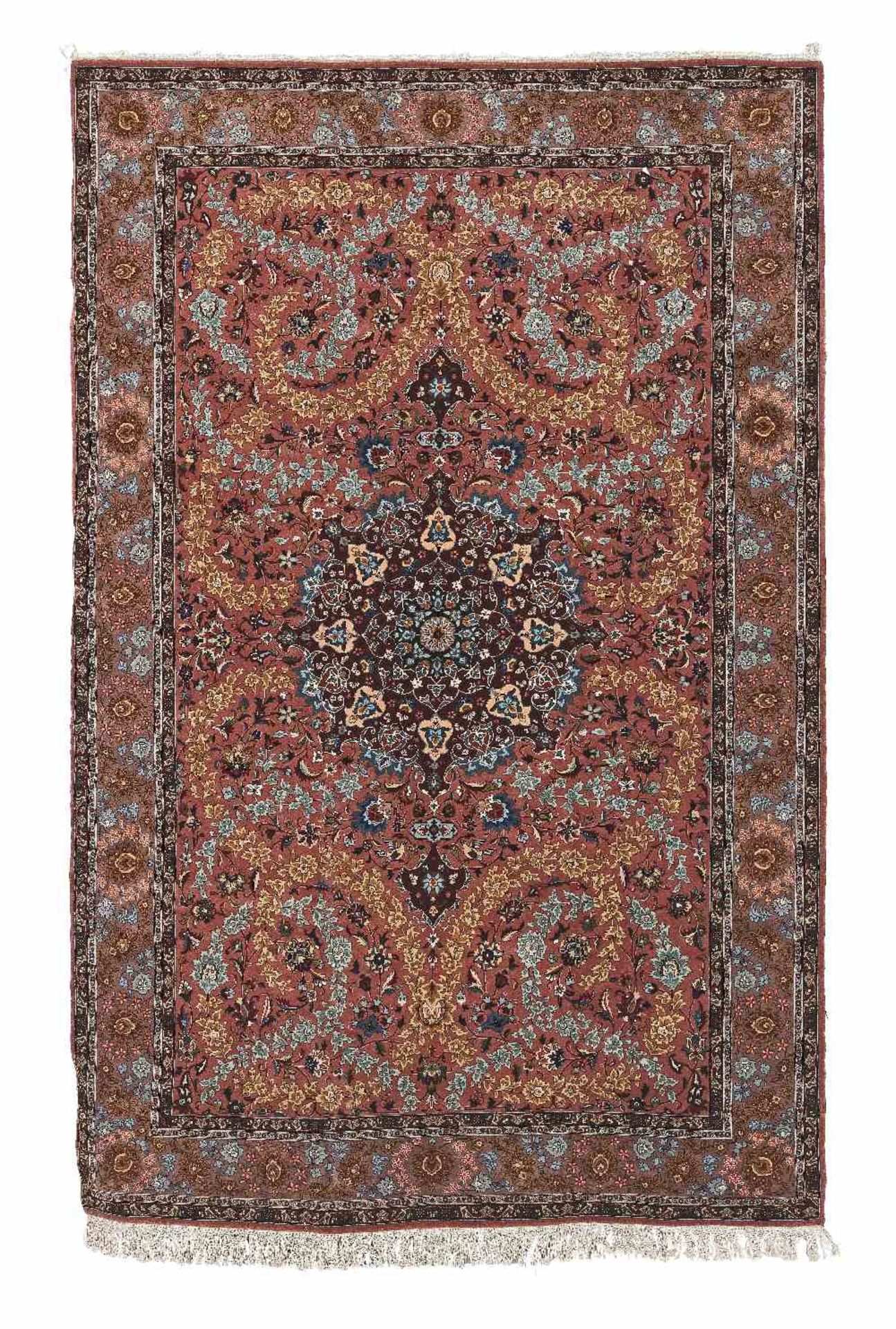 A Qum carpet Central Persia, 304cm x 203cm