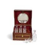 An impressive marquetry inlaid cased travelling cocktail set for eight persons with cut glass ac...