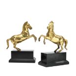 A pair of gilt bronze models of rearing horses in the manner of Ferdinando Tacca (1619&#8211;168...