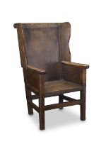 A 19th century oak lambing chair probably of North Country origin
