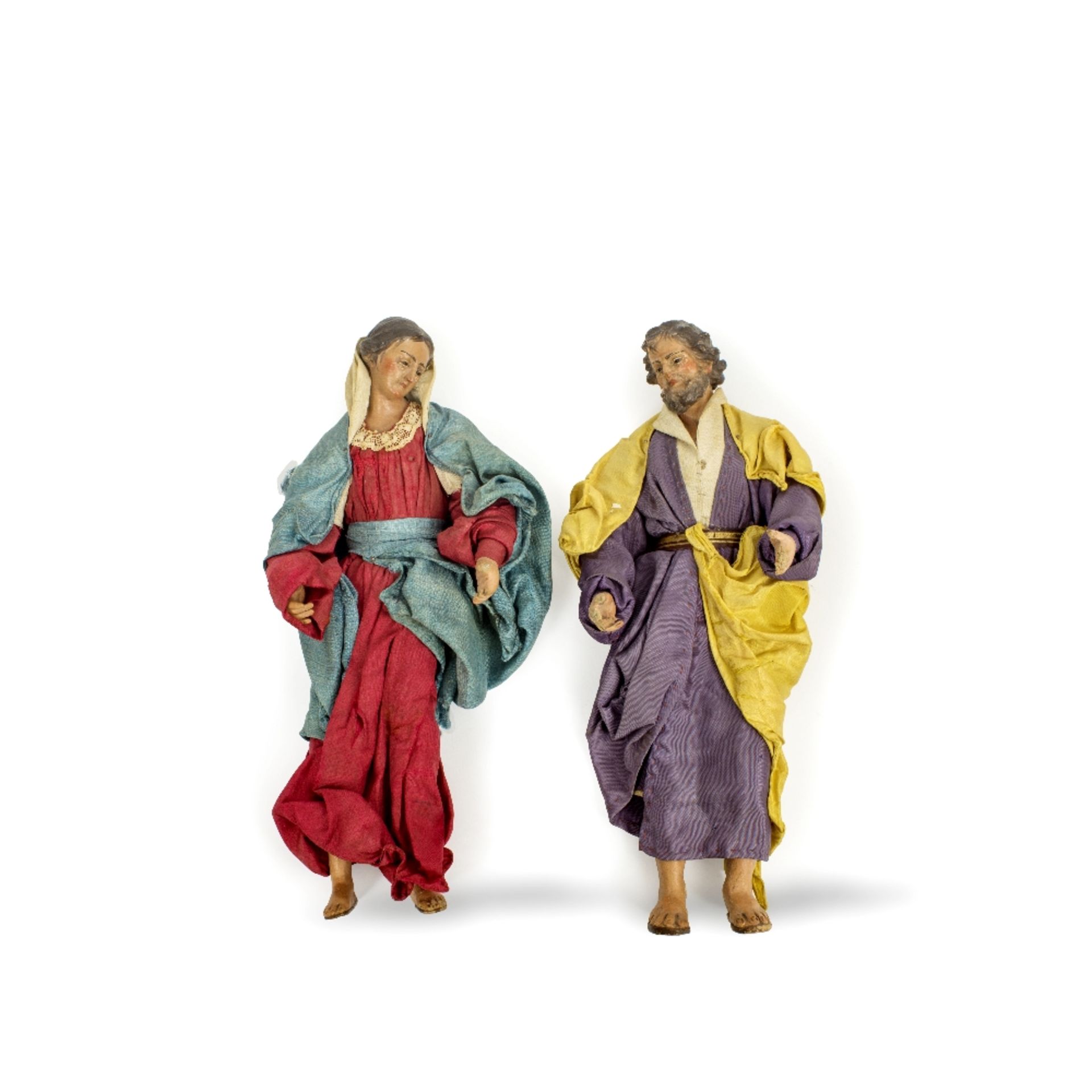 A pair 18th / 19th century Neapolitan carved and painted wood and composition crib figures depic...