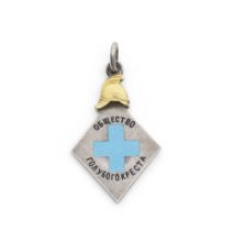 A silver, gold and enamel jeton of the Blue Cross Societymaker's mark in Latin 'E.S', for Eduard...
