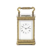 An early 20th century French gilt brass carriage clock with repeat